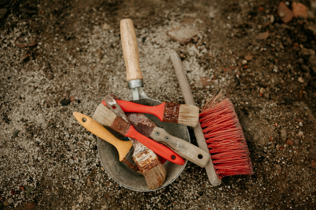 a bucket filled with different types of tools